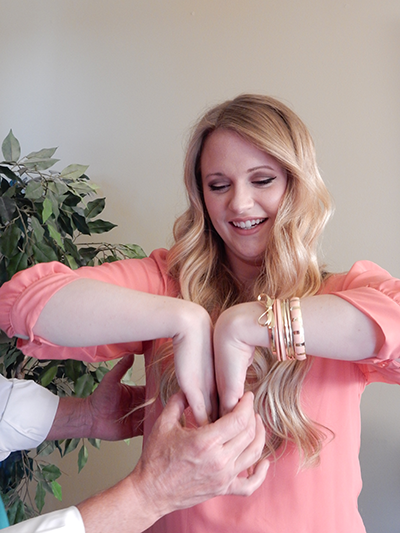 Doctor Helping Patient with Phalens Manuever test carpal tunnel