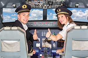 Happy Pilots in the Cockpit with Thumbs Up airline pilots with Carpal Tunnel