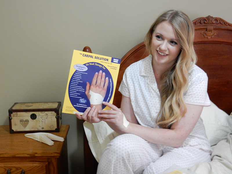 lady-holding-a-carpal-tunnel-cure You need to try the carpal solution first for risk free relief from carpal tunnel pain