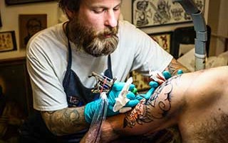 tattoo artist cures carpal tunnel