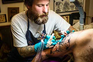 tattoo artist cures carpal tunnel
