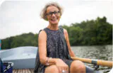 Woman smiling on a boat