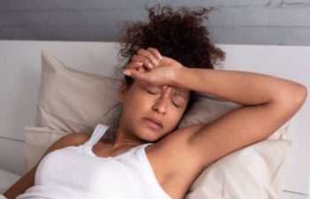 Person with hand numbness at night