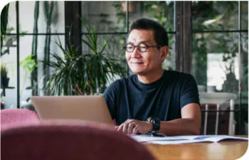 Man happy using his computer